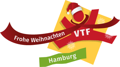 VTF-Logo mit dem roten Figürchen, dass eine Weihnachtsmannmütze und einen Schal trägt, auf dem Frohe Weihnachten steht